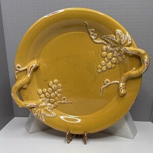 Vibrant Yellow Ceramic Plate with Grapevine Motif